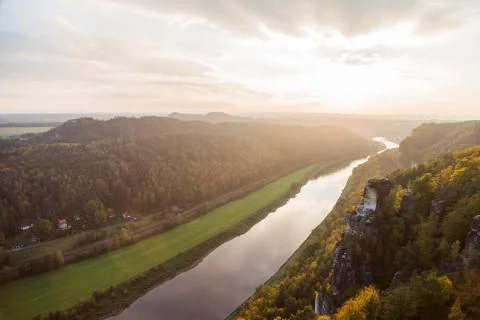 View from high mountain to narrow river in the forest Stock Photos