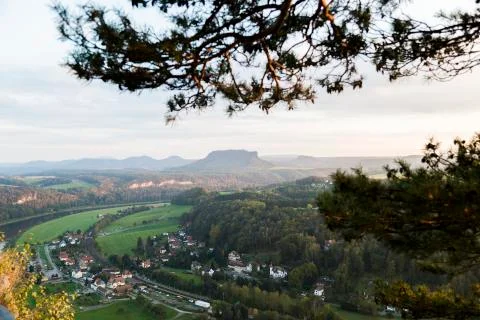 View from high mountain on small german village in green wild forest Stock Photos