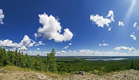 View from a high point of the forest and lake below Stock Photos