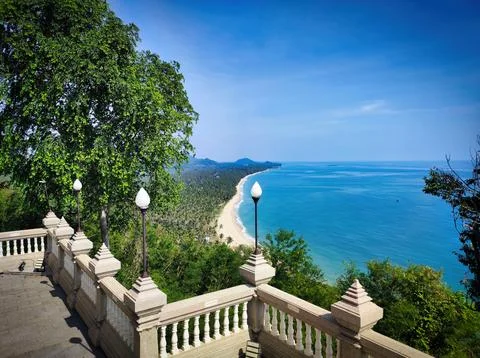 View from a high point overlooking the beach and sea on a sunny day with cl.. Stock Photos