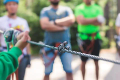 View of high ropes course, process of climbing in amusement acitivity rope pa Stock Photos