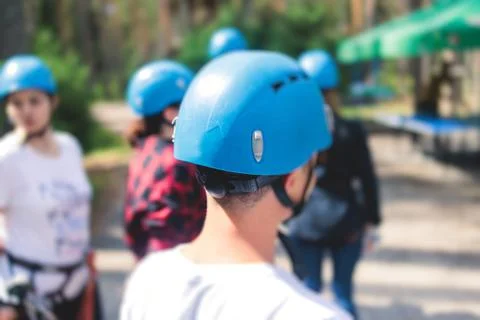 View of high ropes course, process of climbing in amusement acitivity rope pa Stock Photos