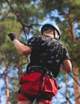 View of high ropes course, process of climbing in amusement acitivity rope .. Fotos Stock