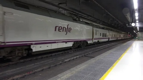 View of high speed modern train departure of Barcelona station public transport Stock Footage 81980004