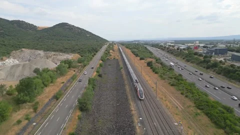 View of a high-speed TGV train traveling at very high speed on the railway Stock Footage 315008061