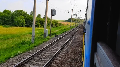 The view from the high-speed train on the beautiful scenery with hills and Stock Footage 111397459