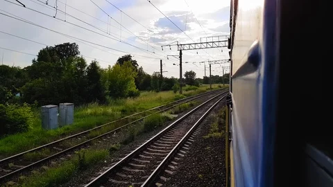 The view from the high-speed train on the beautiful scenery with hills and Stock Footage 111397679