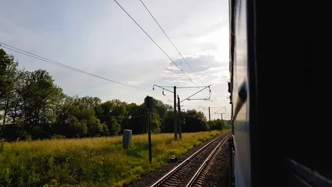The view from the high-speed train on the beautiful scenery with hills and Stock Footage 111397983