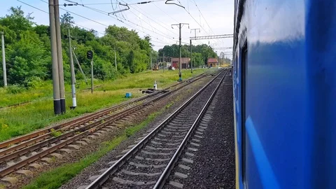 The view from the high-speed train on the beautiful scenery with hills and Stock Footage 111398493