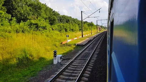 The view from the high-speed train on the beautiful scenery with hills and Stock Footage 111399298