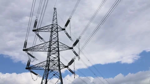 View Of A High-Voltage Power Line Support On the Background Of Cloudy Sky Stock Footage 293716635