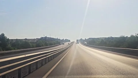 View a highway with a car driving. Stock Footage 282684869