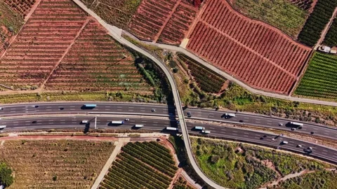 View of highway near fields in Spain during daytime Stock Footage 327643390