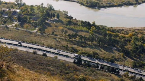 View of the highway road at the mountain area near river Vídeos de archivo 82639971