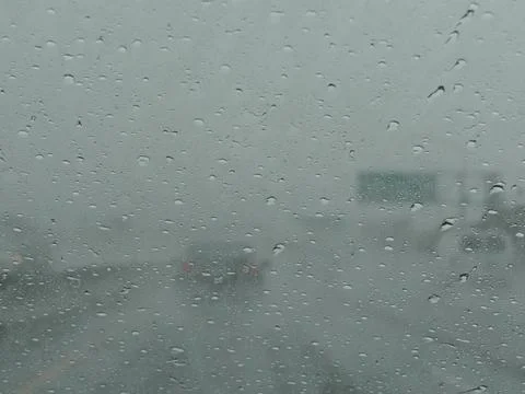 View on highway through wet window Stock Photos