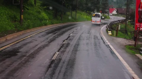 View on highway through wet windshield. Drive in rainy day. Vídeos de archivo 114738972