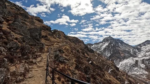View of hike along railing high in the Himalayan mountains of Gosaikunda, Stock Footage 277446454