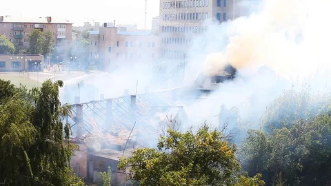 View from the hill to the fire in the old house Video stock 80254948