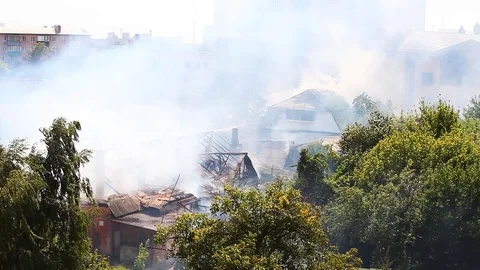 View from the hill to the fire in the old house Stock Footage 80255213