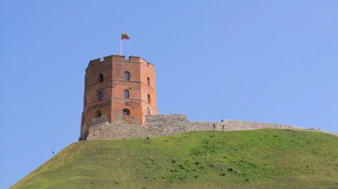 View of the hill of Gediminas' Tower from below, flag of Lithuania, static Stock Footage