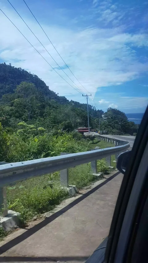View from hill with the ocean above 스톡 동영상 293947999