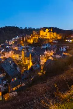 View from a hill over the beautiful Eifel village Monschau with its castle an Stock Photos