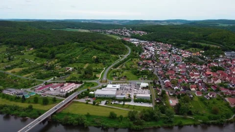 View from the hill to a small town through the hand Stock Footage 154824618