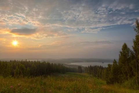 View from a hill at sundown Stock Photos