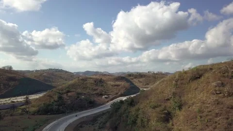 View of Hills and Winding road at Bypass Mandalika Lombok Stock Footage 345207302