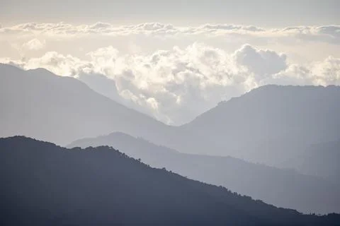 View of hills with cloud forest, Dramatic clouds between the mountains, Province 写真素材