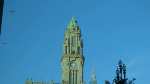 View of the historic tower of the Clérigos Tower rising above the city skyline Stock Footage 327687012