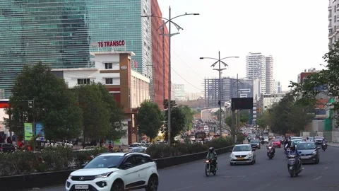 View of the Hitech City Main Road with vehicle traffic in Hyderabad Stock Footage 286739993
