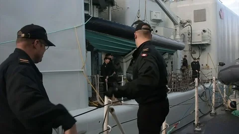 View from HMCS Halifax (FFH 330) as HMCS Athabaskan (DDG 282) arrives - 2015 Stock Footage 94054726