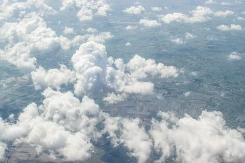 View of Ho Chi Minh city, Vietnam under white cloudy. View from air plane. Stock Photos