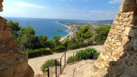 View of the hole in the wall and the view of the bay of castillo de juan Stock Footage 249755876