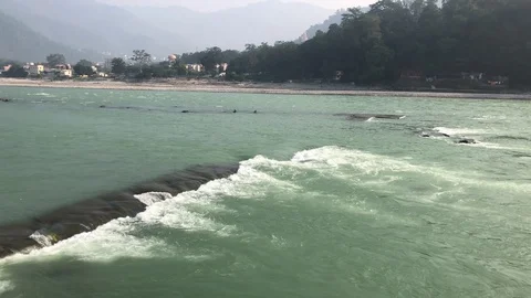 View of the Holy Ganges River from the holy city of Rishikesh Stock-Footage 120280483