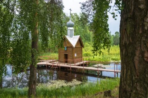 View of the Holy spring of St. Tikhon of Lukh in a summer day, village Timiry Stock Photos