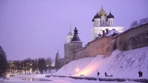 View of the Holy Trinity Cathedral in winter evening, snowfall. Pskov Kremlin Stock Footage 262567904