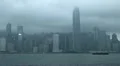 View of Hong Kong Skyline with Skyscrapers and Boats in Monsoon Season Rainy Day HD Footage