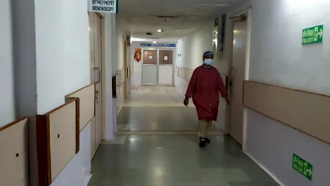 View of Hospital Corridor going towards ICU Hallway Stock Footage 219447255