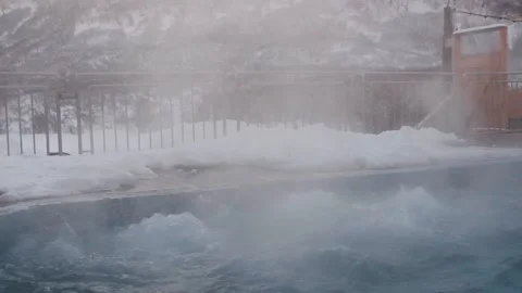View of the hot outdoor pool in winter Stock Footage 150783233