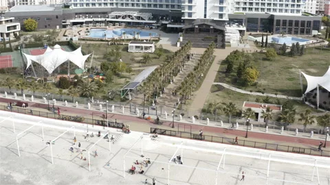 View of the hotel grounds with swimming pool Stock Footage 134753869