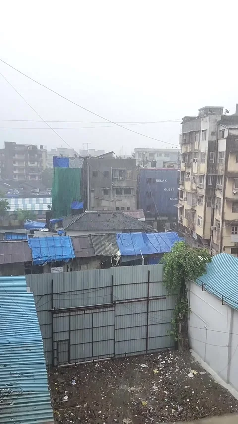 View of house, Raining in Mumbai during the day Stock Footage 293199953