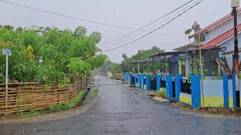 A view of a housing complex when it is raining Stock Footage 291378812