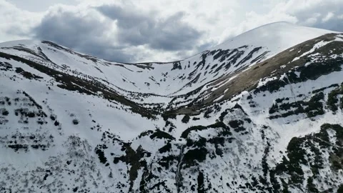 View of Hoverla from a drone and waterfall in the mountains, melting snow i.. Stock Footage 242811555