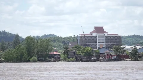 View of huge building on the side of the river Stock Footage 256138658