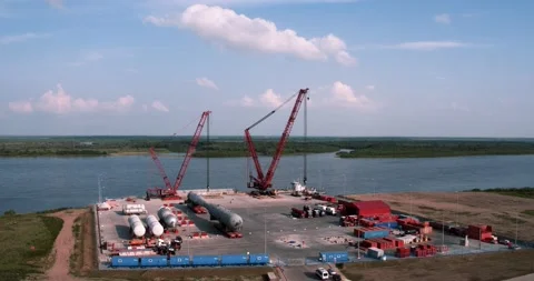 View of the huge cranes on the river pier Stock Footage 138225041