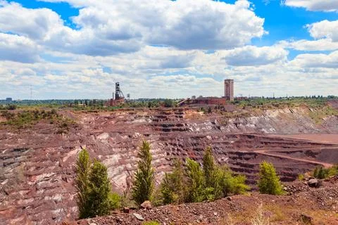 View of huge iron ore quarry in Kryvyi Rih, Ukraine. Open pit mining Stock Photos