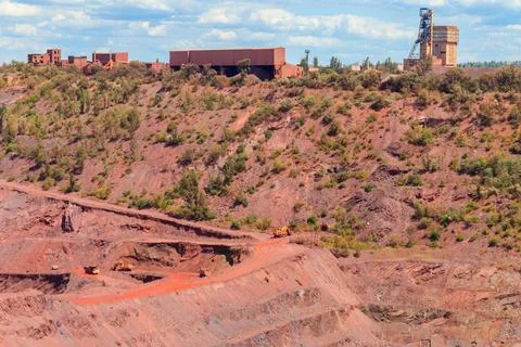 View of huge iron ore quarry in Kryvyi Rih, Ukraine. Open pit mining Stock Photos