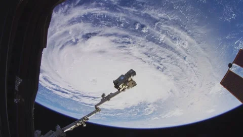 View of a Hurricane Eye over Earth from a Space Station Stockbeeldmateriaal 250765360